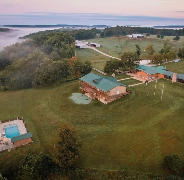 Falcon lodge wedding venue aerial view showing full estate - 100 guest capacity - sleeps 26 - all-in-one venue + accommoda...