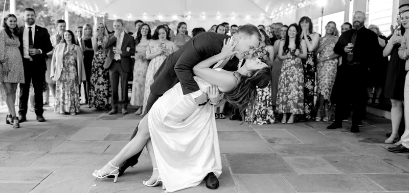 RD Entertainment dance floor dip on a stone patio with guests looking on