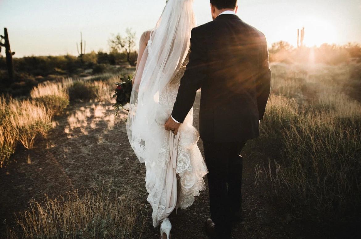 Desert sunset wedding portrait by GracedByLight Photography, Arizona