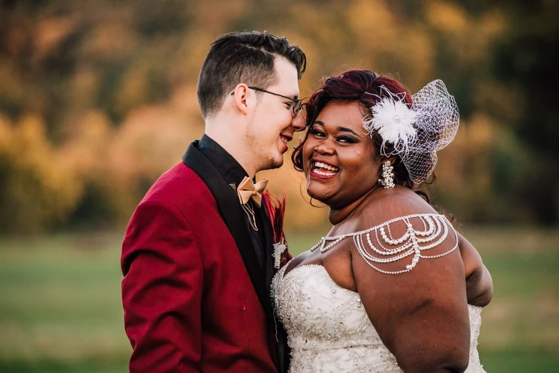 Brittany Juravich Photography close portrait of a smiling couple in warm evening light