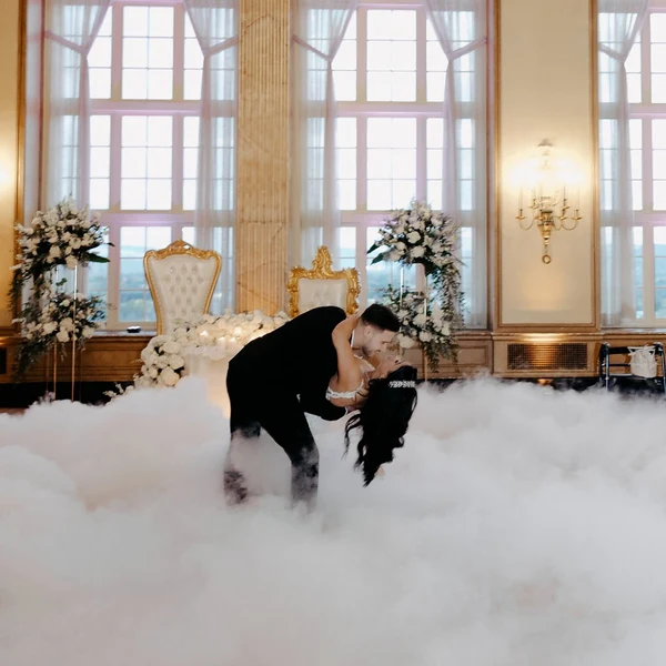 DJ Mike Melice dancing on clouds effect during a first dance in a ballroom