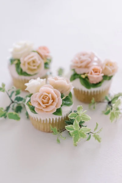 LILA Cake Shop cupcakes topped with piped buttercream roses