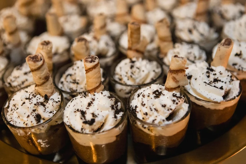 Personal Touch Dining chocolate mousse dessert shooters topped with wafer rolls